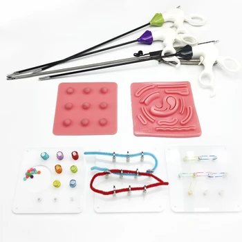 1 комплект тренажера для лапароскопической хирургии, пинцеты для удержания иглы, разделительные пинцеты, разделительный зажим, стоматологическое оборудование
